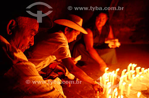  People lighting candles at a religious festival - Bom Jesus da Lapa city - Bahia state - Brazil 