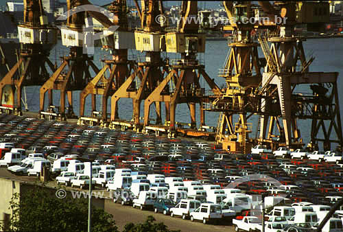  Cars for export in the seaport with derricks in the backgroung - Rio de Janeiro city - Rio de Janeiro state - Brazil 