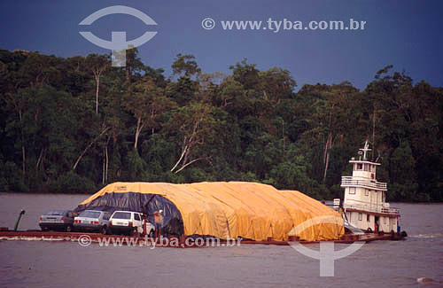  Barge transporting goods and cars on the Branco River (White River) - Amazonas state - Brazil 