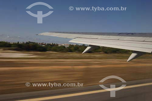  Airplane wing during take off - aviation - Alagoas state aiport - Brazil March 2006 