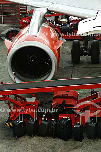  Luggage in front of airplane turbine - Congonhas Airport - Sao Paulo city - Sao Paulo state - Brazil - november 2006 