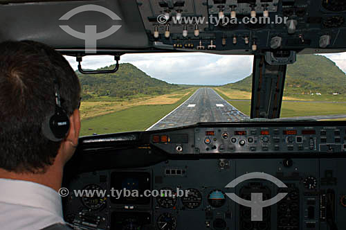  Interior of airplane cockpit with pilot and co-pilot - VARIG (Recife-Noronha) - Brazil 