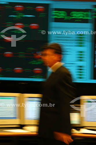  Man working in front of computers 