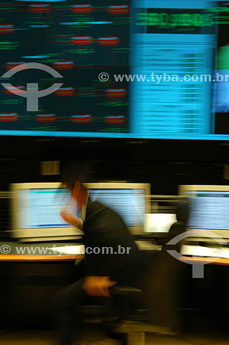  Man working in front of computers 