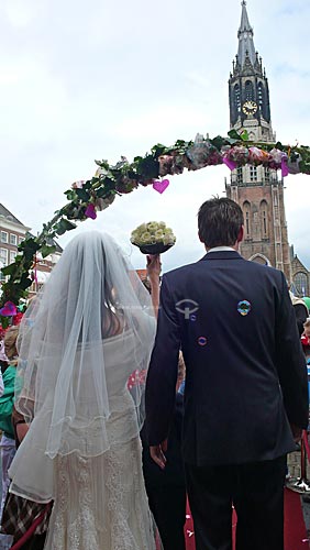  Marriage in the city of Delft with the tower of the Church Nieuwe Kerk (New Church) to the bottom - Holland 