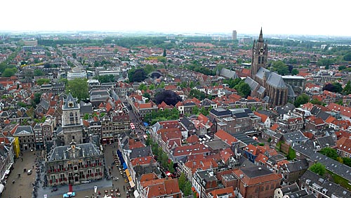  Panoramic view of the city of Delft (13th century) with the Municipal Hall (Stadhuis) below to the left and the Oude Kerk (Old Church) to the  right - Delft - Holland 