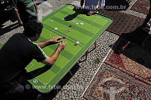  Subject: Button Soccer match in the antiques fair of the Joquei Clube square (Jockey Club) 