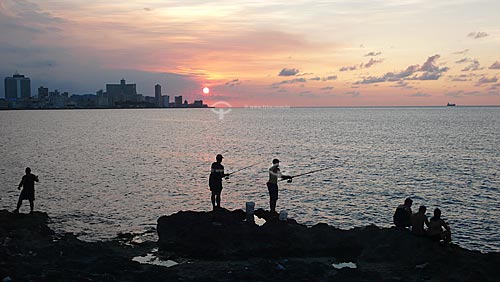  Subject: Fishermen in Malecon at the sunset / Local: Havana - Cuba / Date: october 2009 