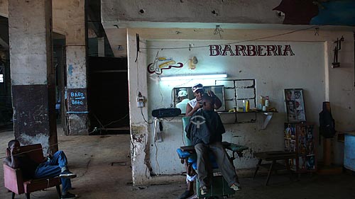 Subject: Boy cutting hair in barber shop  / Local: Havana - Cuba / Date: october 2009 