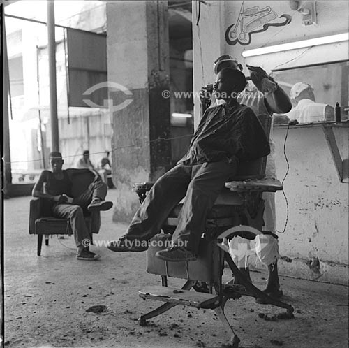  Subject: Boy cutting hair in barber shop 