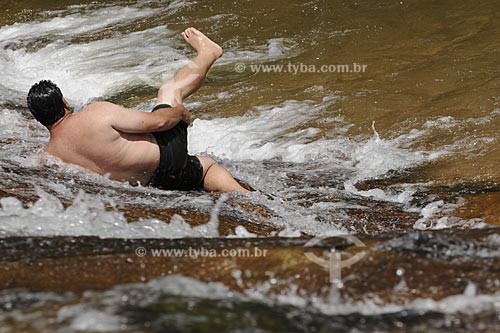  Subject: Man bathing in Maria Comprida waterfalls  / Place:  Secretario - Petropolis municipalty - Rio de Janeiro state - Brazil  / Date: 21/02/2009 