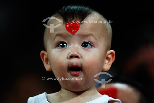  Subject: Child watching the Beijing Olympic Games  / Place:  Beijing - China  / Date: Agosto de 2008 