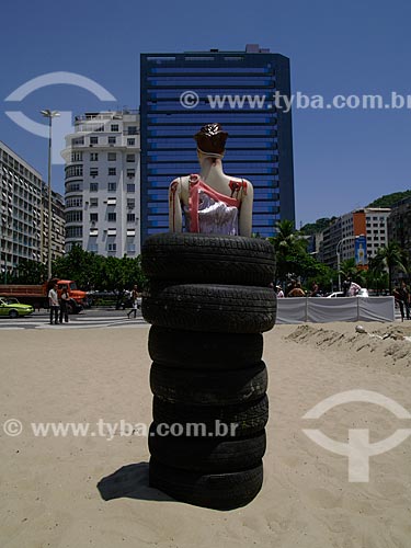  Manifestation against violence at Copacabana Beach, organized by Rio de Paz (Peace in Rio - NGO). Mannequin inside a pile of tires represent thousands of people that are vanished in Rio de Janeiro  - Rio de Janeiro city - Brazil
