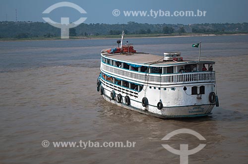  Subject: Typical boat of the amazon crossing over the 