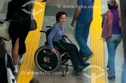  Subject: Person with disability waits while other passengers are getting off  the train at Arcoverde metro station  / Place:  Rio de Janeiro city - Rio de Janeiro state - Brazil  / Date: 08//06/2010 