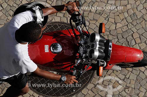  Subject: Motorcyclist riding his motorcycle in Copacabana during the summer  / Place:  Rio de Janeiro city - Rio de Janeiro state - Brazil  / Date: 01/2009 