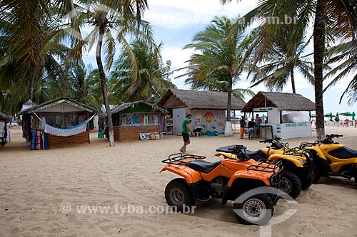  Subject: Commerce - Small business huts in Gunga Beach with Quads for tourism in the foreground  / Place:  South shore of Maceio city - Alagoas state - Brazil  / Date: 2011 