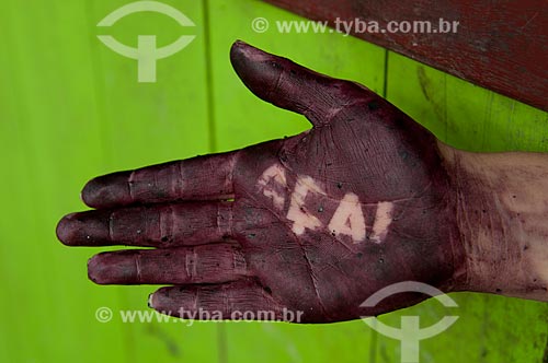  Subject: Hand with the word Acai written on it / Place: Abaetetuba city - Para state (PA) - Brazil / Date: 11/2009 