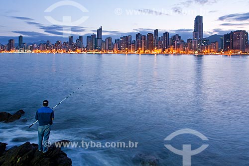  Subject: Man fishing at Pontal Norte / Place: Balneario Camboriu city - Santa Catarina state (SC) - Brazil / Date: 10/2011 