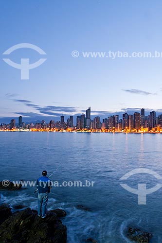  Subject: Man fishing at Pontal Norte / Place: Balneario Camboriu city - Santa Catarina state (SC) - Brazil / Date: 10/2011 