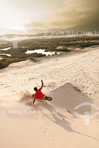  Subject: Sandboarding on the dunes of Conceicao Lagoon / Place: Florianopolis city - Santa Catarina state (SC) - Brazil / Date: 28/10/2011 