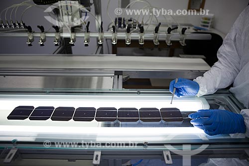  Scientist manipulating silicon blades during metallization process of its - Solar Cells Laboratory of Solar Technological Center of PUC-RS  - Porto Alegre city - Rio Grande do Sul state (RS) - Brazil