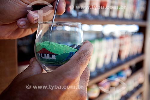  Subject: Traditional production of bottles with drawings made ??with colored sand / Place: Beberibe city - Ceara state (CE) - Brazil / Date: 11/2011 