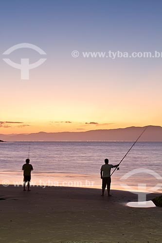  Subject: Men fishing at sunset at Daniela Beach / Place: Florianopolis city - Santa Catarina state (SC) - Brazil / Date: 10/2012 
