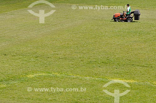  Subject: Worker mowing the grass Stadium Anisio Haddad (1968) - also known as Rio Pretao / Place: Sao Jose do Rio Preto city - Sao Paulo state (SP) - Brazil / Date: 02/2012 