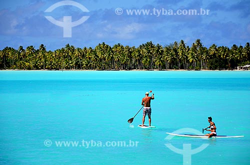  Subject: Couple practicing Paddle Surf / Place: Bora Bora Island - French Polynesia - Oceania / Date: 10/2012 