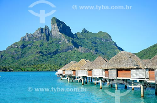  Subject: Bungalows of a resort with Otemanu Mountain in the background / Place: Bora Bora Island - French Polynesia - Oceania / Date: 10/2012 
