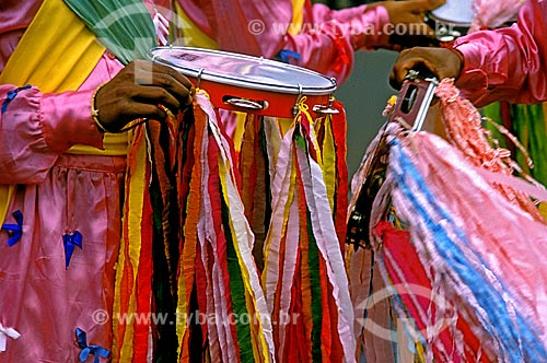  Subject: Detail of a man playing the the tambourine in congada in Olympia city / Place: Olimpia city - Sao Paulo state (SP) - Brazil / Date: 1995 