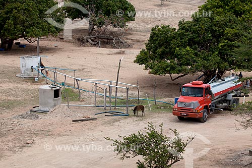  Subject: Water truck filling a tank of water in the dry season / Place: Near to Arcoverde city - Pernambuco city (PE) - Brazil / Date: 01/2013 