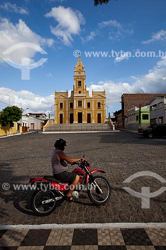  Subject: Motorcyclist at Nossa Senhora da Luz Square with the Nossa Senhora da Luz Cathedral (1837) - also known as Luz Cathedral (Light Cathedral) - in the background / Place: Guarabira city - Paraiba state (PB) - Brazil / Date: 02/2013 