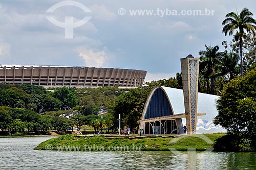  Sao Francisco de Assis Church (1943) - also known as Pampulha Church - on the banks of Pampulha Lagoon with the Governor Magalhaes Pinto Stadium (1965) - also known as Mineirao - in the background   - Belo Horizonte city - Minas Gerais state (MG) - Brazil