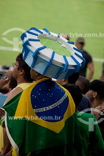  Fan with a mockup of the stadium in the head in test event at Journalist Mario Filho Stadium - also known as Maracana - match between Ronaldo friends x Bebeto friends marks the reopening of the stadium   - Rio de Janeiro city - Rio de Janeiro state (RJ) - Brazil