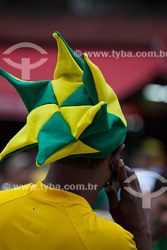  Soccer fan wearing a hat with the colors of Brazil at the entrance the Journalist Mario Filho Stadium - also known as Maracana - before the game between Brasil x Spain by final match of Confederations Cups  - Rio de Janeiro city - Rio de Janeiro state (RJ) - Brazil