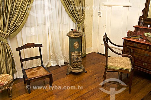  Subject: Furniture and stove of heating for cold seasons in exhibition at of House Museum Quissama - antique residence of Viscount of Araruama / Place: Quissama city - Rio de Janeiro state (RJ) - Brazil / Date: 06/2013 