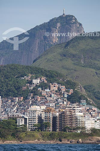  Subject: Sofitel Rio de Janeiro Hotel, Pavao Pavaozinho slum and Copacabana Beach buildings with the Christ the Redeemer (1931) in the background / Place: Copacabana neighborhood - Rio de Janeiro city - Rio de Janeiro state (RJ) - Brazil / Date: 11/ 