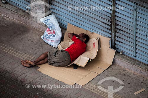  Subject: Homeless man lying on Sete de Setembro Avenue / Place: Porto Velho city - Rondonia state (RO) - Brazil / Date: 11/2013 