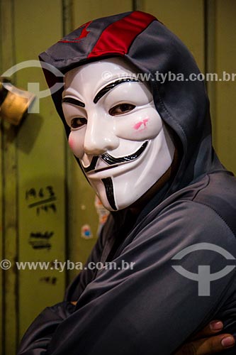  Subject: Masked man - mask used in the movie V for Vendetta (2006) based on the design of the character V comic book by Alan Moore and David Lloyd who in turn was inspired by the face of Guy Fawkes, conspirator who wanted to implode the English Parl 