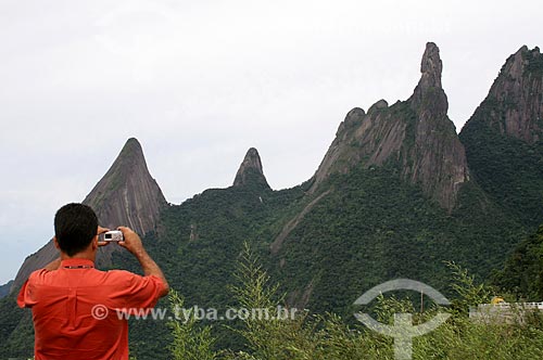  Subject: Man photographing the Escalavrado Peak, Dedo de Nossa Senhora Peak, Dedo de Deus Peak and Cabeca de Peixe Peak / Place: Teresopolis city - Rio de Janeiro state (RJ) - Brazil / Date: 03/2012 