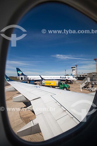  Subject: Detail of airplane wing of Azul Brazilian Airlines after landing - Santa Genoveva Airport (1955) / Place: Goias state (GO) - Brazil / Date: 05/2014 