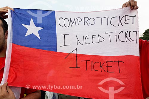  Subject: Soccer fans of Chile with flag  that says 