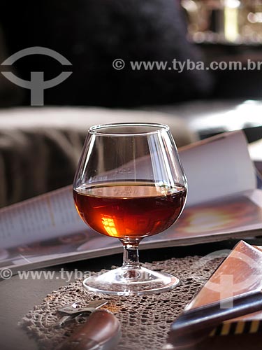  Subject: Goblet of brandy and cigar cutter on the table during the winter / Place: Canela city - Rio Grande do Sul state (RS) - Brazil / Date: 05/2014 