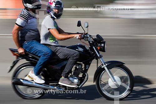  Motorcyclist carrying a passenger - Viaduct of Posse  - Nova Iguacu city - Rio de Janeiro state (RJ) - Brazil