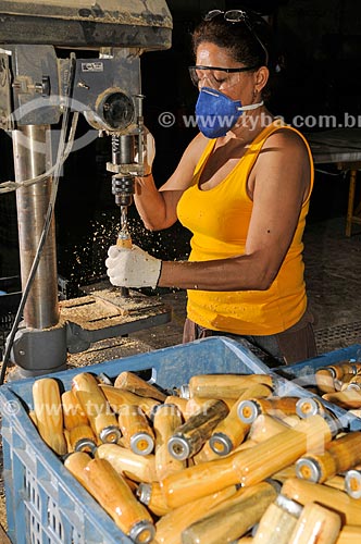  Woman working with drill - producing of wooden parts for furniture  - Mirassol city - Sao Paulo state (SP) - Brazil
