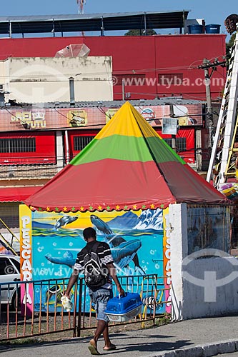  Man walking near the amusement park on Eucalyptus Square  - Queimados city - Rio de Janeiro state (RJ) - Brazil