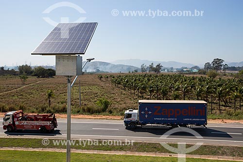  Detail of solar cell used to Metropolitan Arch illumination with truck in the background  - Seropedica city - Rio de Janeiro state (RJ) - Brazil