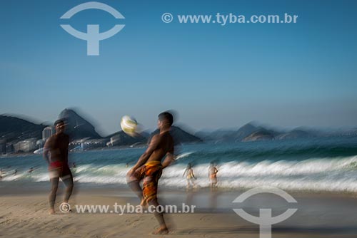  Peoples playing soccer on the waterfront of Copacabana Beach  - Rio de Janeiro city - Rio de Janeiro state (RJ) - Brazil